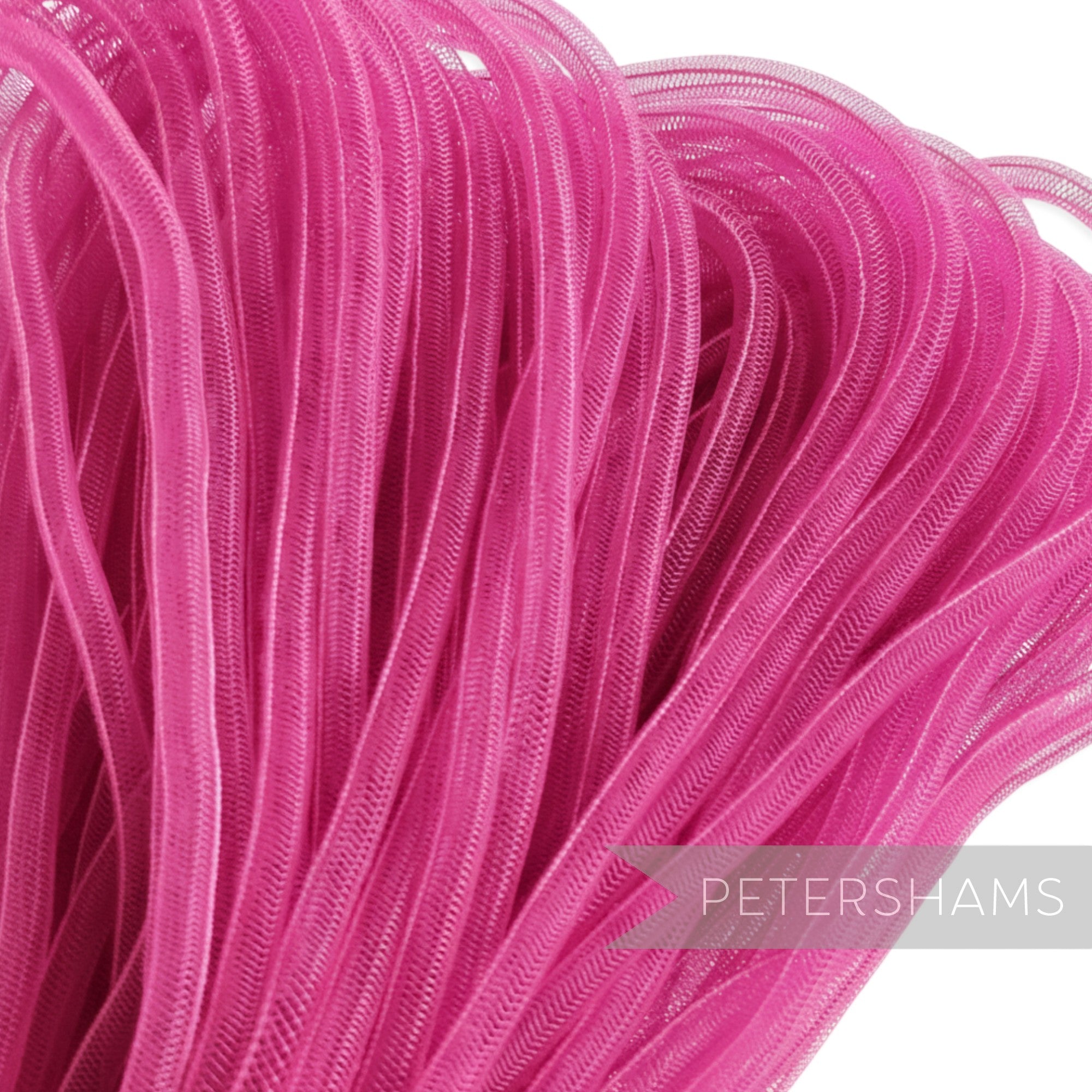 Petershams bright pink 6mm tube crinoline mesh for millinery and hat making, sold by the metre.