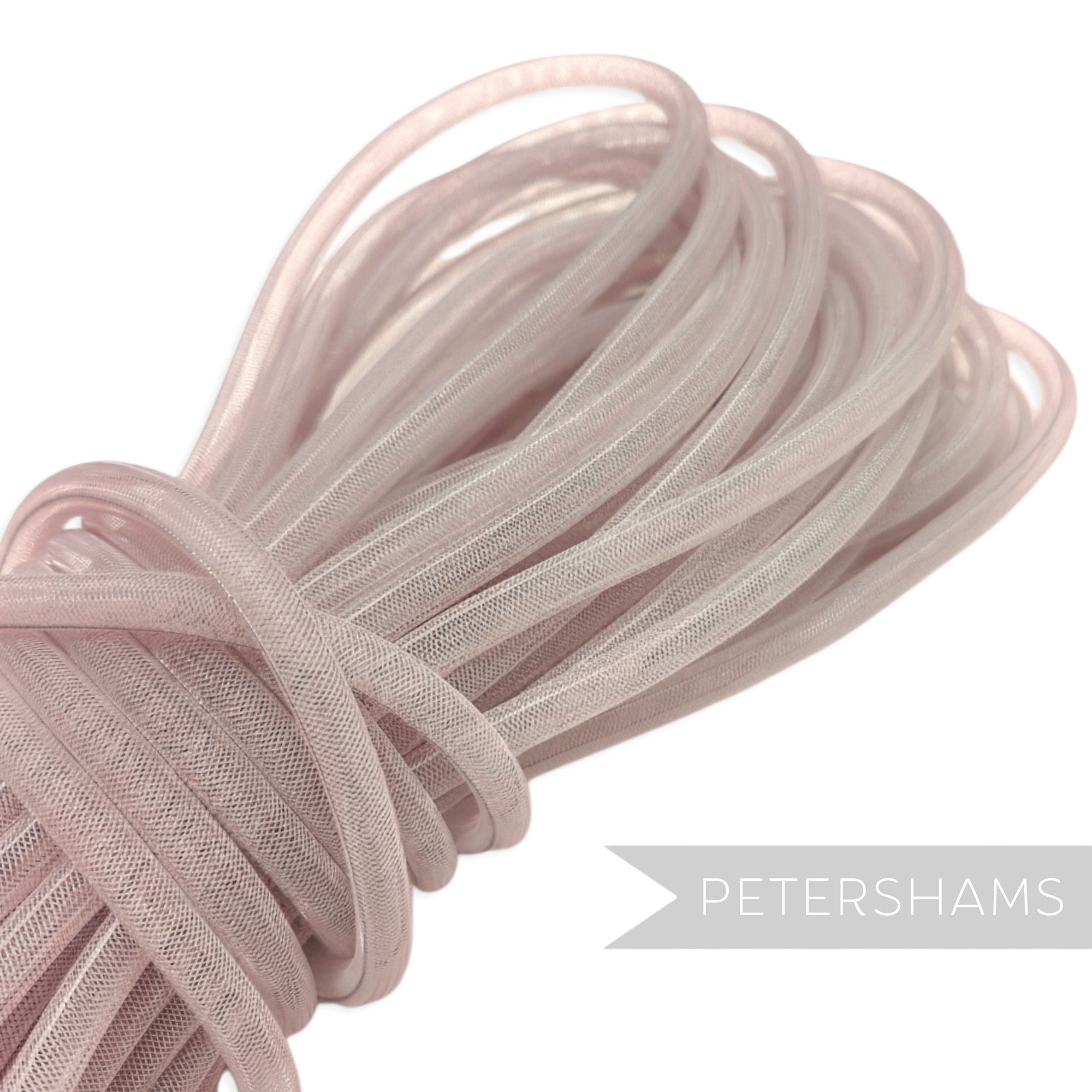 Petershams pale pink 8mm tube millinery crin netting, ideal for hat making and decorative trim.