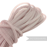 Petershams pale pink 8mm tube millinery crin netting, ideal for hat making and decorative trim.