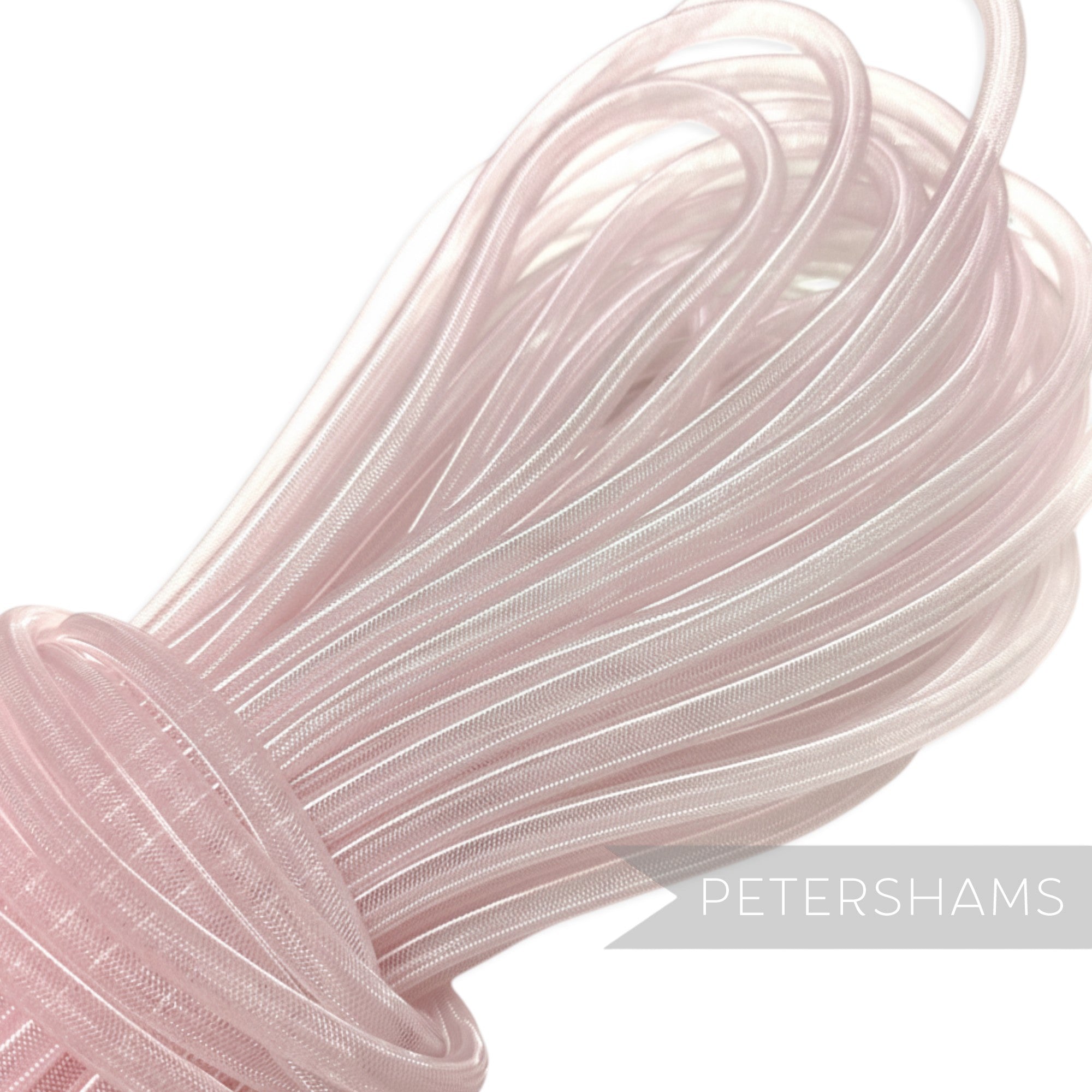 Petershams pale pink 8mm tube millinery crin, a slightly sheer synthetic trim for hat making and embellishments.