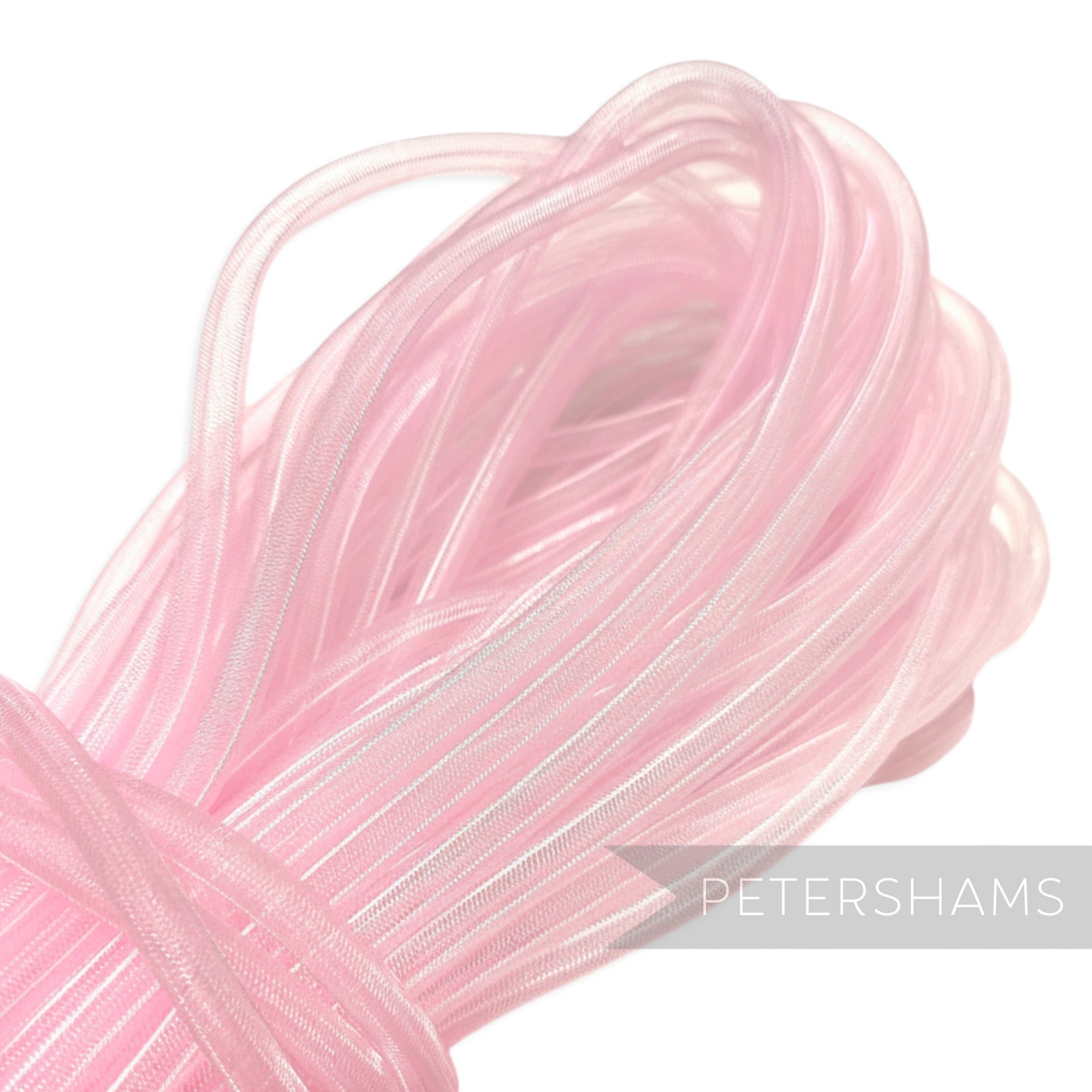 Petershams pink 8mm tube millinery crin, a slightly sheer, gathered trim for hat making and embellishments.
