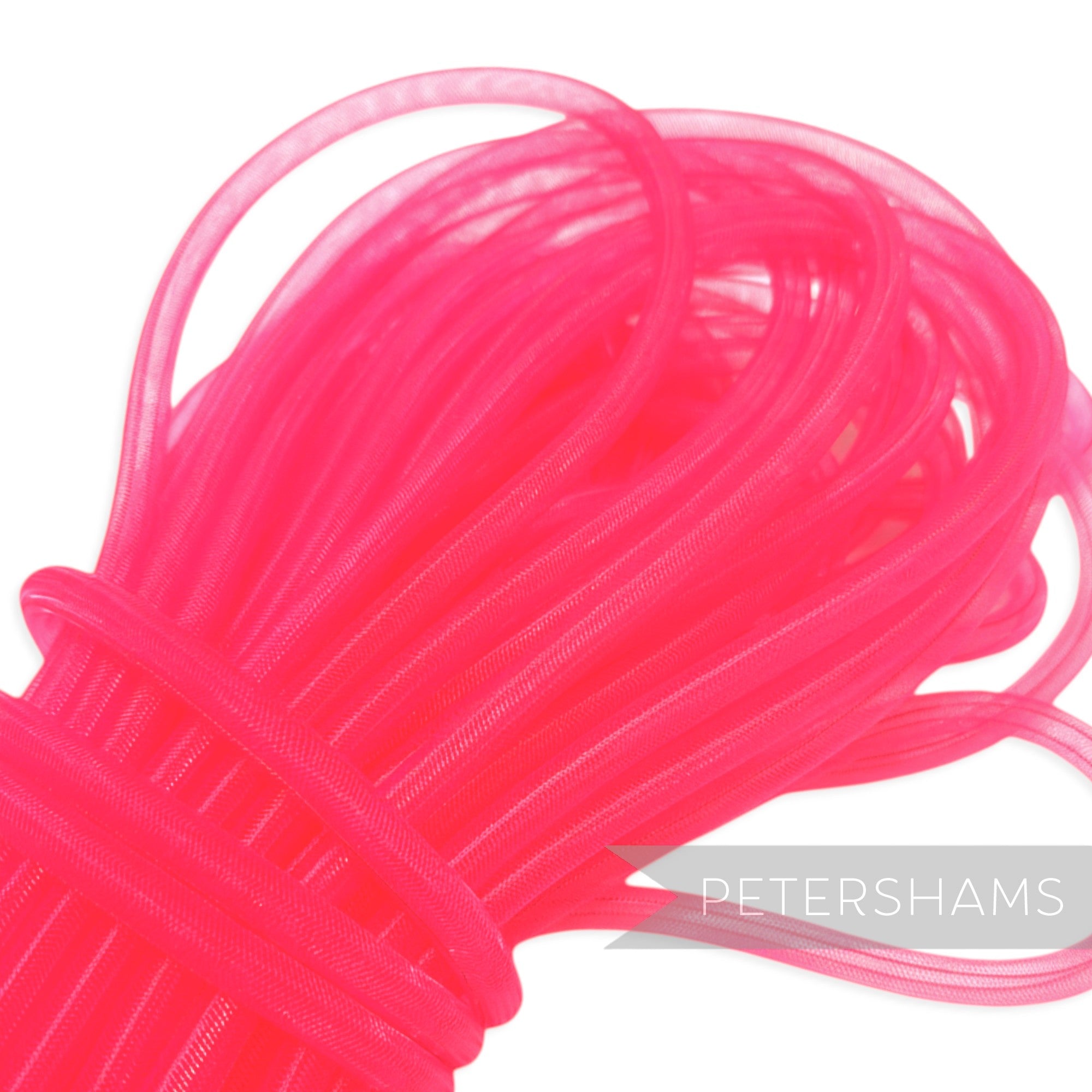 Petershams bright pink 8mm tube millinery crin, a mesh-like trim for hat making and decorative accents.