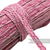 Petershams Millinery Supplies pink crinoline braid with a zig-zag pattern, 14mm wide.