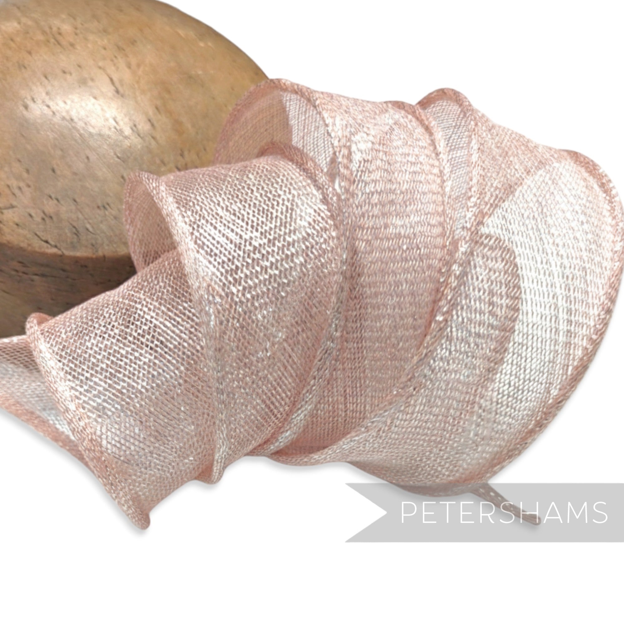 Petershams Millinery Supplies pale pink metallic lurex sinamay ribbon trim with hand-rolled edges.