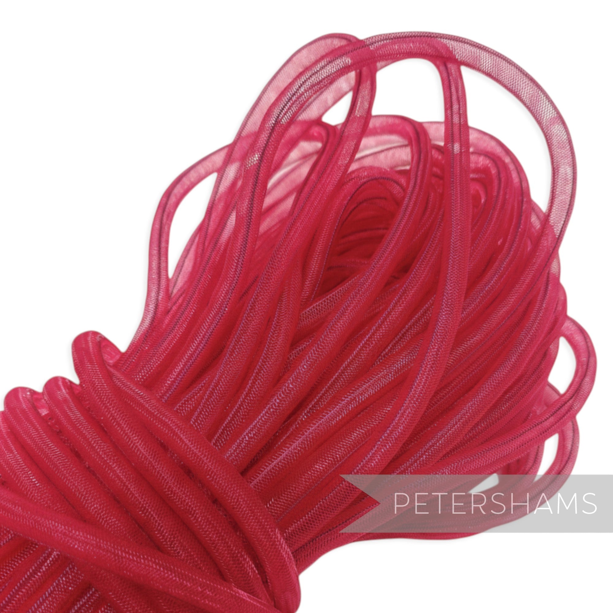 Petershams bright pink 8mm tube millinery crin, a mesh material for hat making and trims.