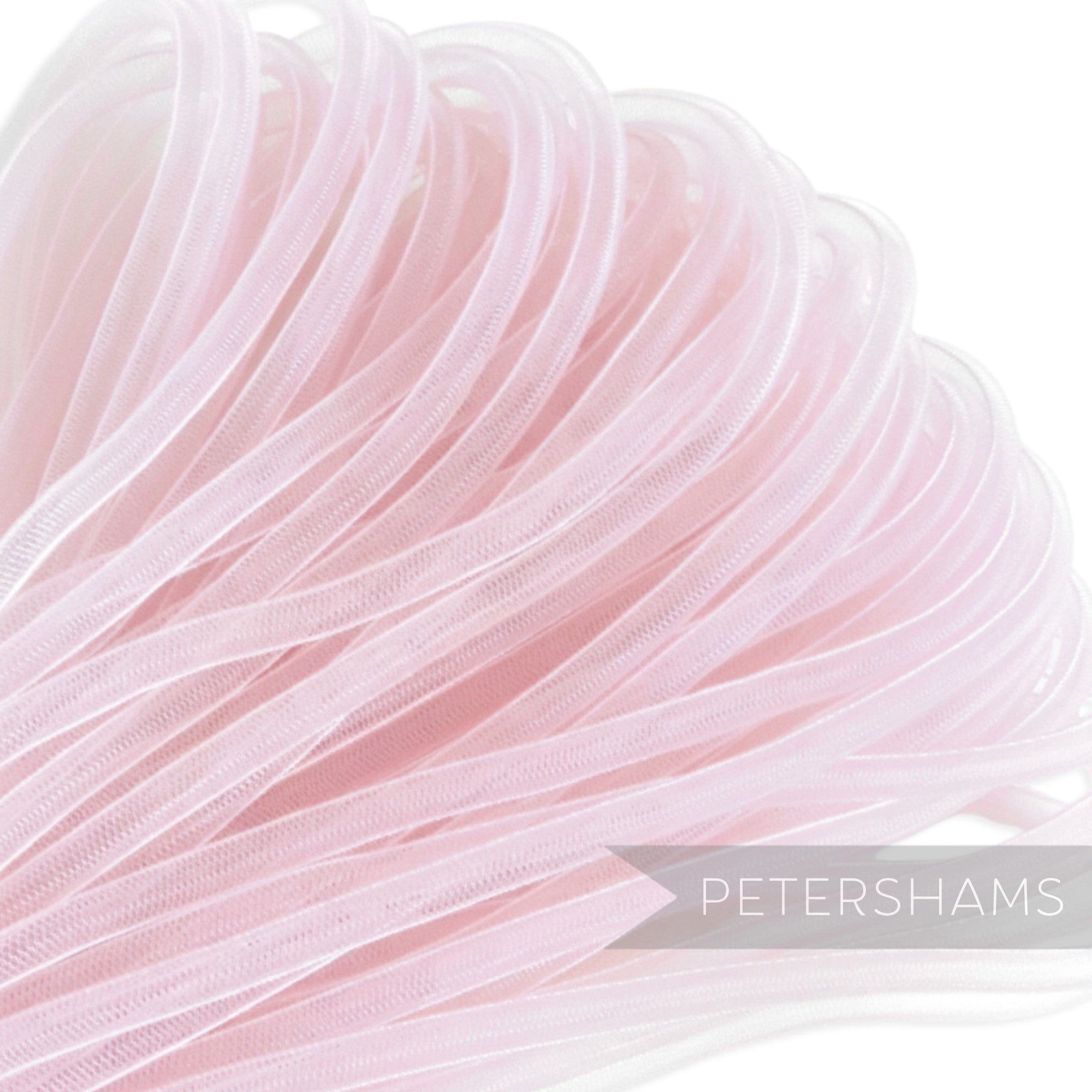 Petershams light pink 6mm tube crin netting for millinery and hat making. Slightly sheer with gathered threads.