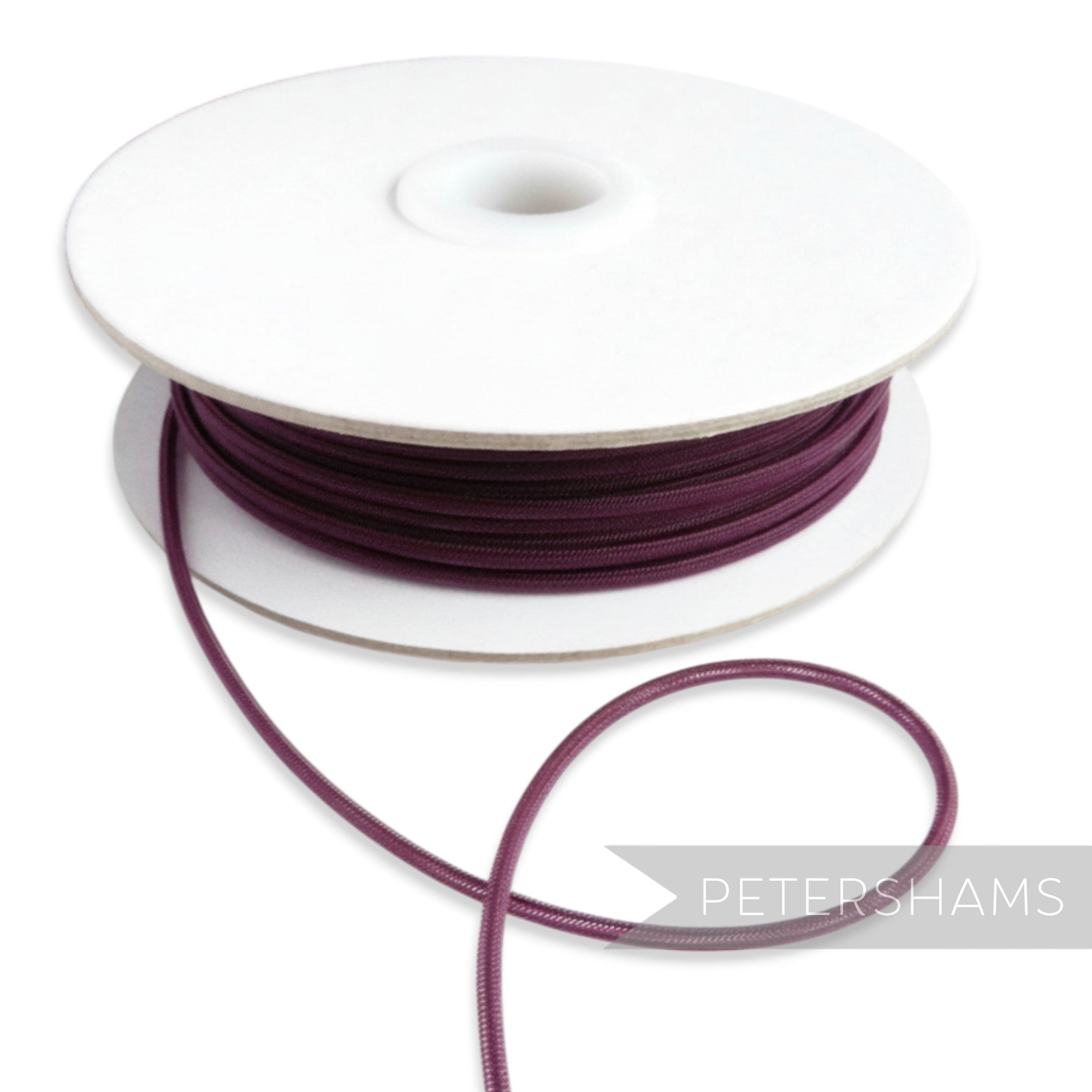 Petershams Millinery Supplies plum 2.5mm tubular crinoline cord with a central thread for gathering.