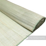 Petershams Millinery Supplies light green polyester abaca fabric with a slightly glossy, rustic texture and wavy threading.