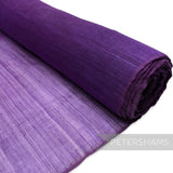 Petershams Millinery Supplies purple polyester abaca fabric with a rustic, slightly sheer texture and wavy threading. Ideal for millinery.