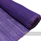 Petershams Millinery Supplies purple polyester abaca fabric with a slightly glossy, rustic texture and wavy threading.