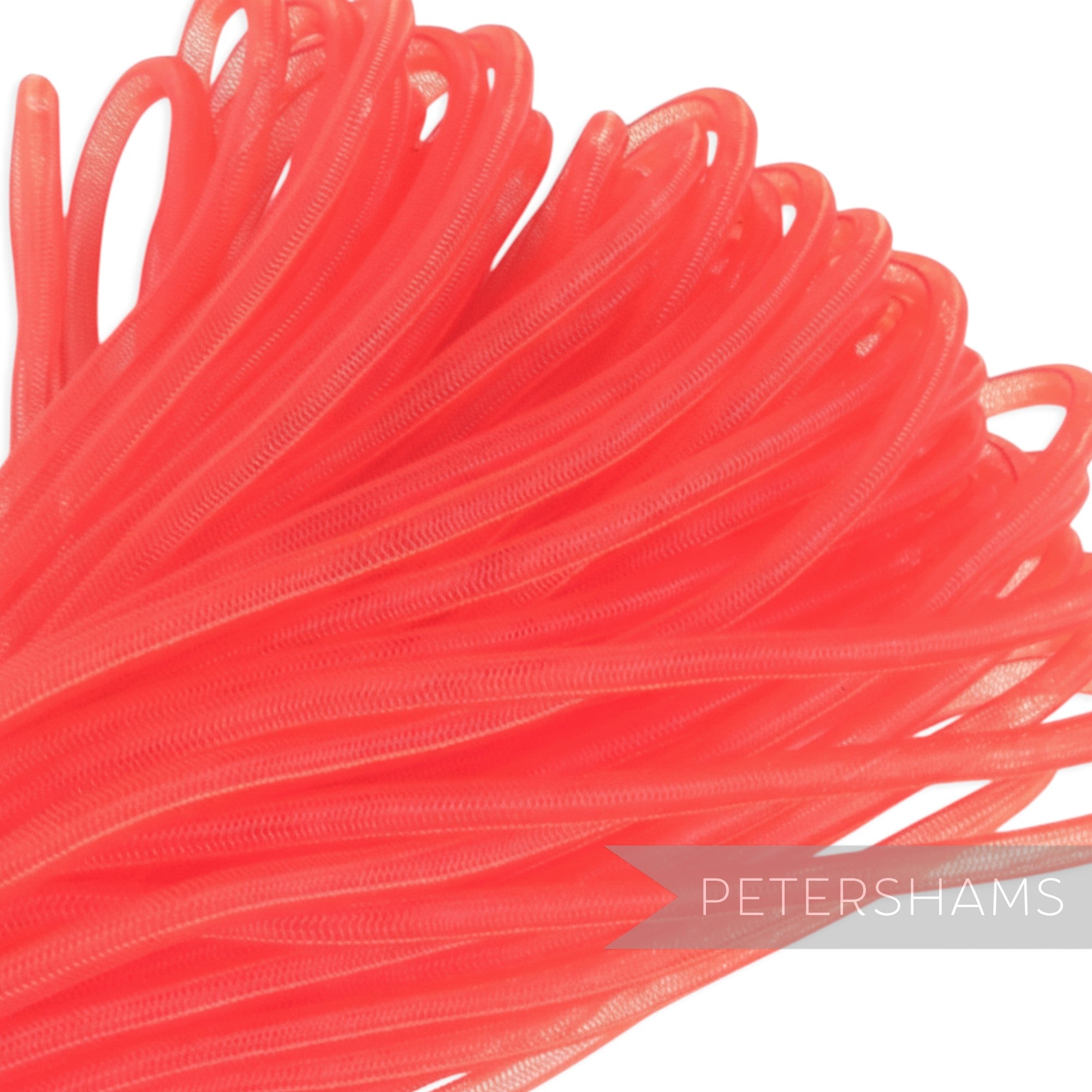 Petershams red 6mm tube millinery crin for hat making and trims. Slightly sheer mesh tubing.