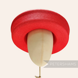 Petershams red polybraid sailor hat form with a large upturned brim, ideal for occasion wear.
