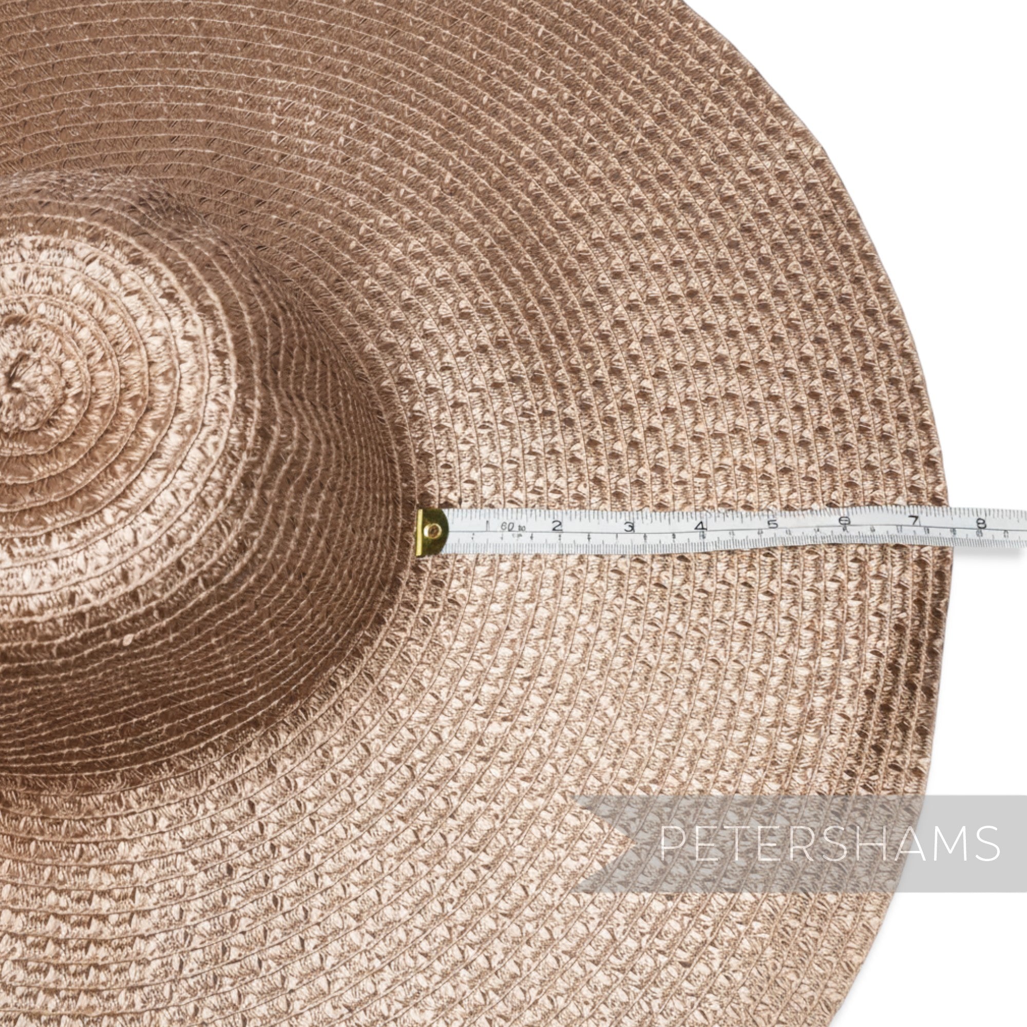 Petershams Millinery Supplies rose gold polybraid capeline hat body with intricate weave and 15-inch brim.