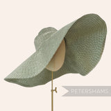 Petershams Millinery Supplies sage green polybraid capeline hat body with intricate weave and 15-inch wide brim.