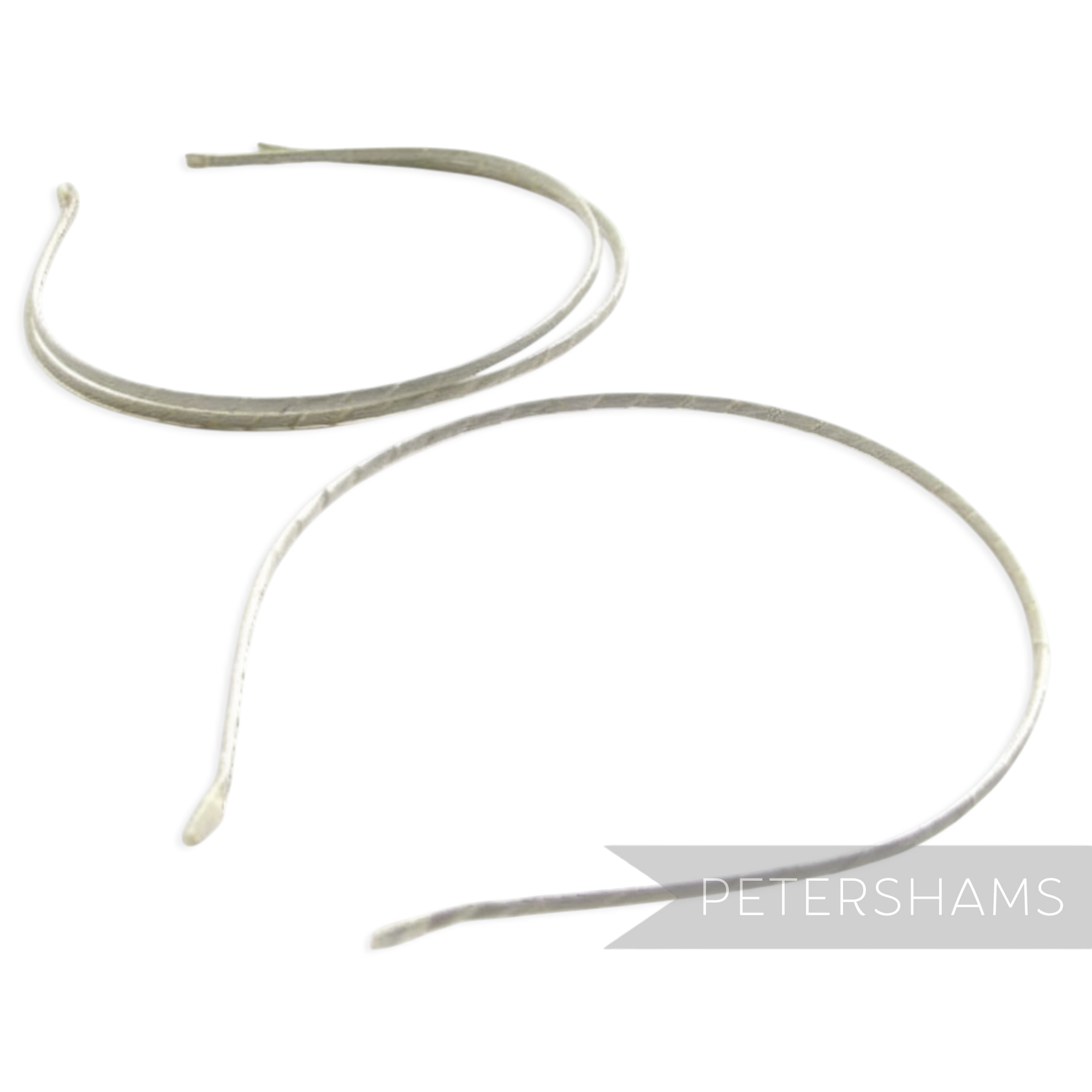 Petershams Millinery Supplies silver ribbon-wrapped metal headbands, 3.5mm wide, ideal for fascinators and hats.