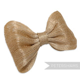 Petershams natural sisal straw 'Ellie' bow in a light tan colour. Measures 14cm wide, perfect for hat trimming.