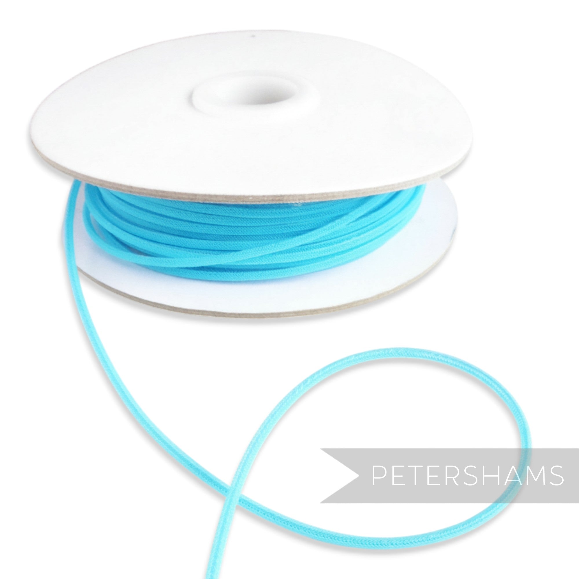 Petershams Millinery Supplies turquoise 2.5mm tubular crinoline trim with a central thread for gathering.