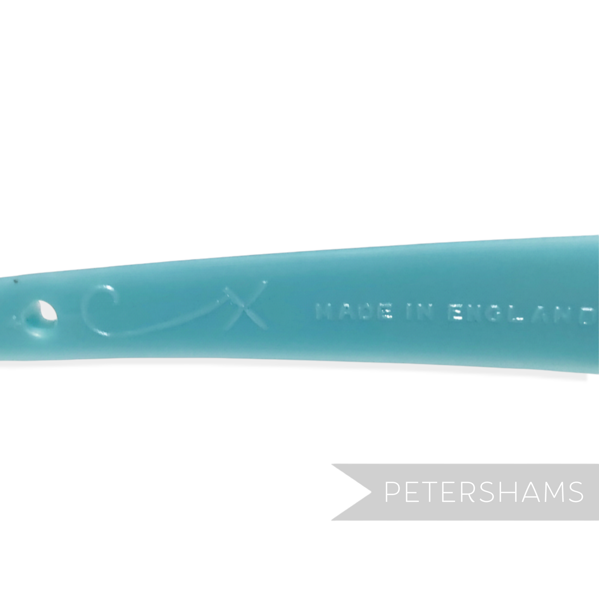 Petershams Millinery Supplies vintage 1960s light blue skinny headband with fine grid pattern and 'Made in England' marking.