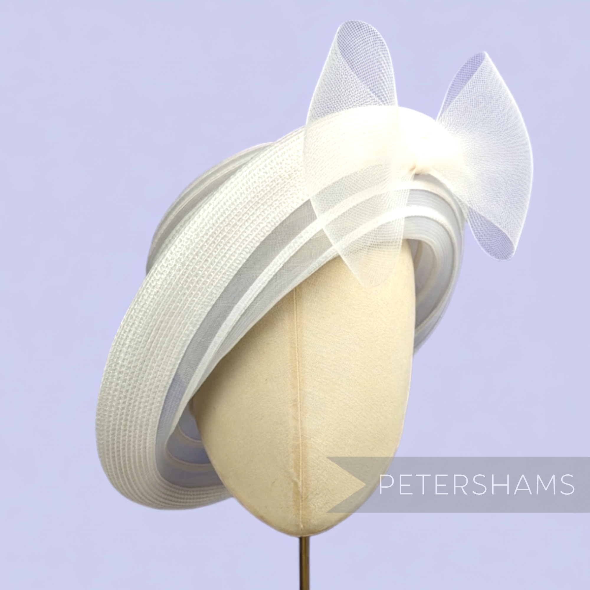 Petershams vintage 1990s ivory crinoline and poly-braid hat base with rolled edge brim and sheer bow detail.