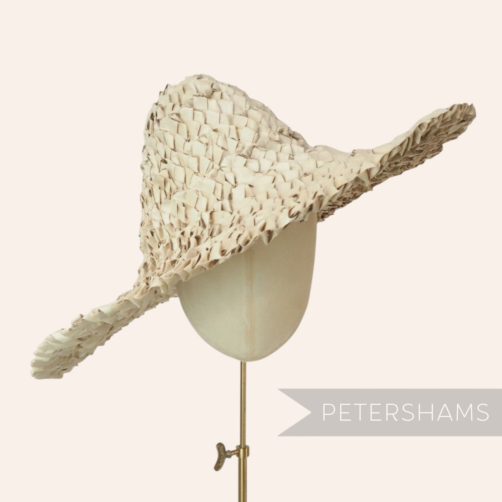 Petershams 1960s natural straw capeline hat body with ruffled texture and wide brim.