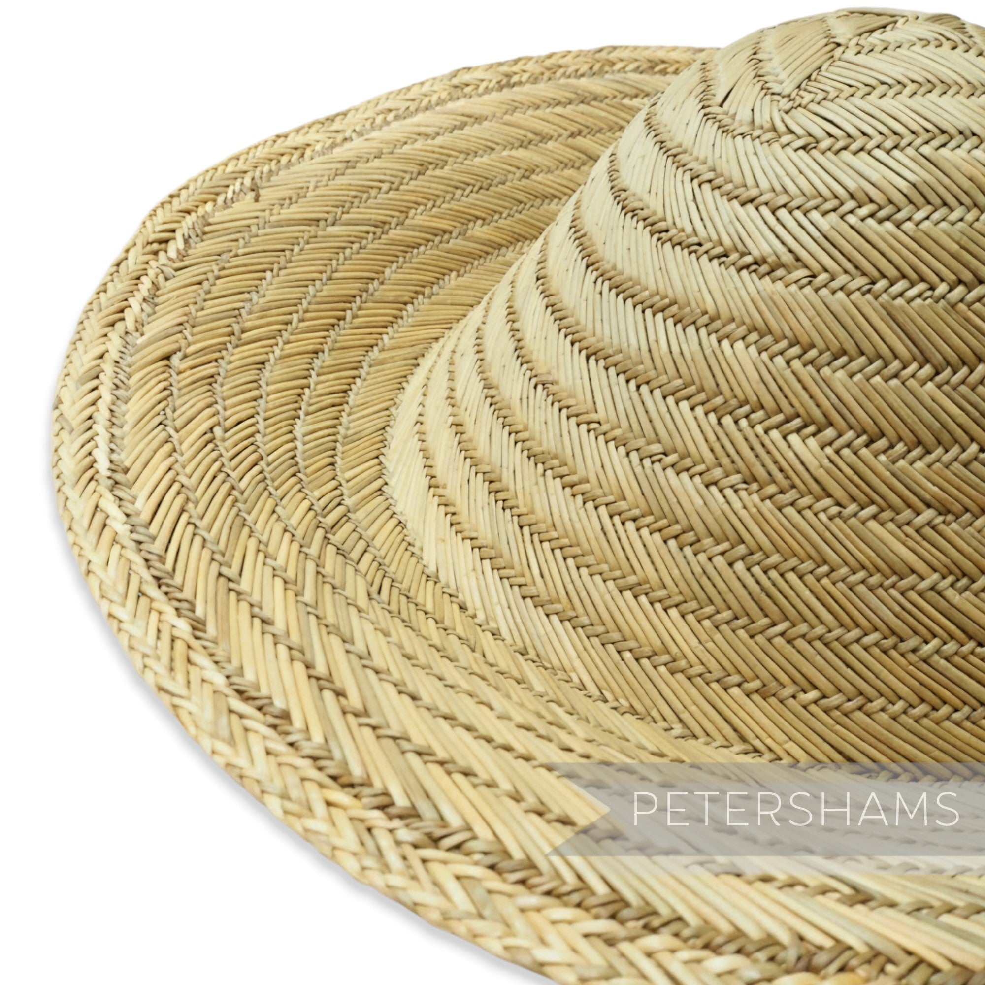 Petershams Millinery Supplies vintage natural straw capeline hat body with spiral weave, 11-inch brim.