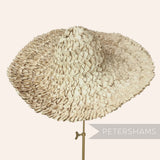 Petershams vintage 1960s natural straw capeline hat body with ruffled texture and wide brim.