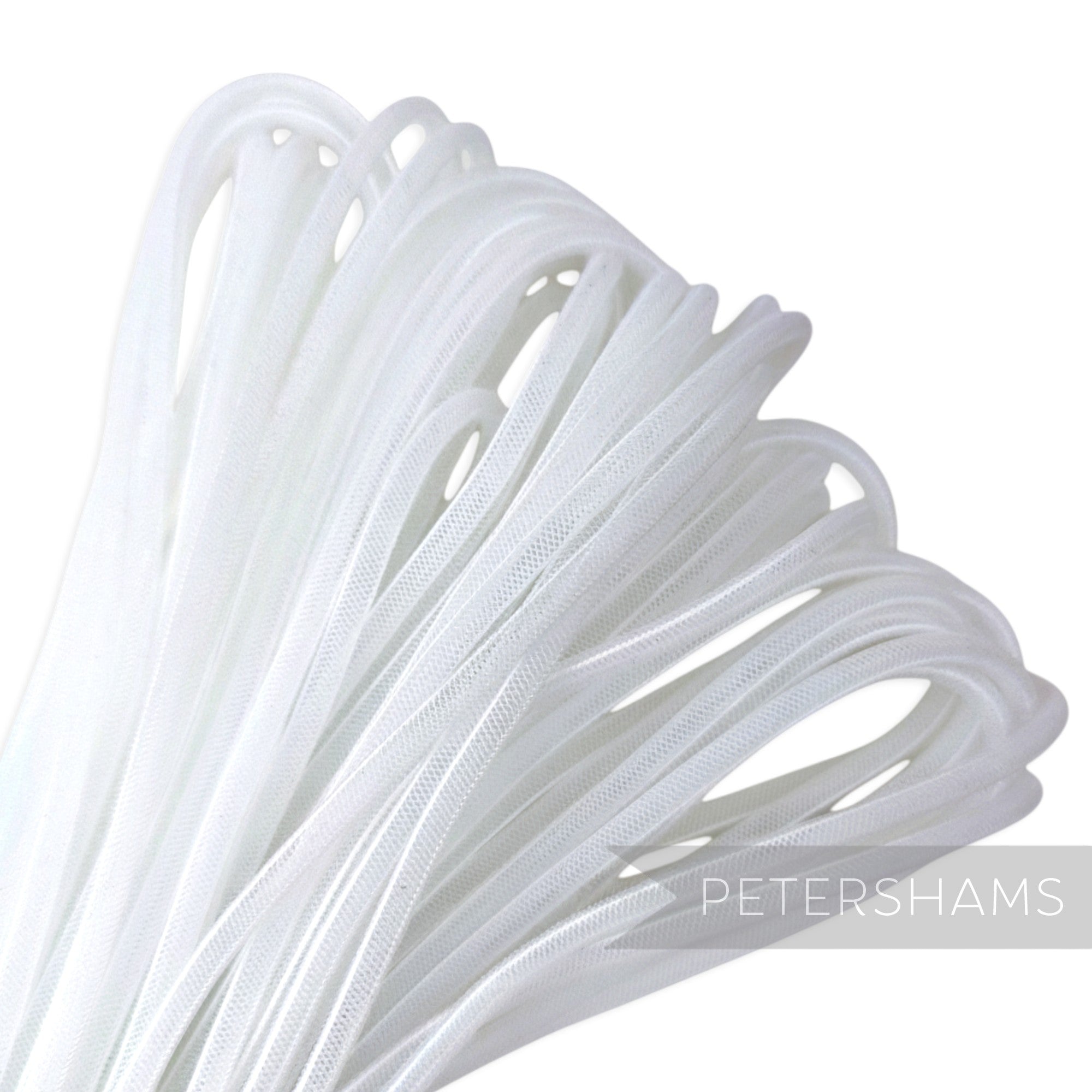 Petershams white 4mm tube millinery crinoline trim, slightly sheer with a gathered thread. Ideal for hat making.