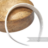 Petershams white satin covered plastic headband, 24mm wide flat base, ideal for millinery.