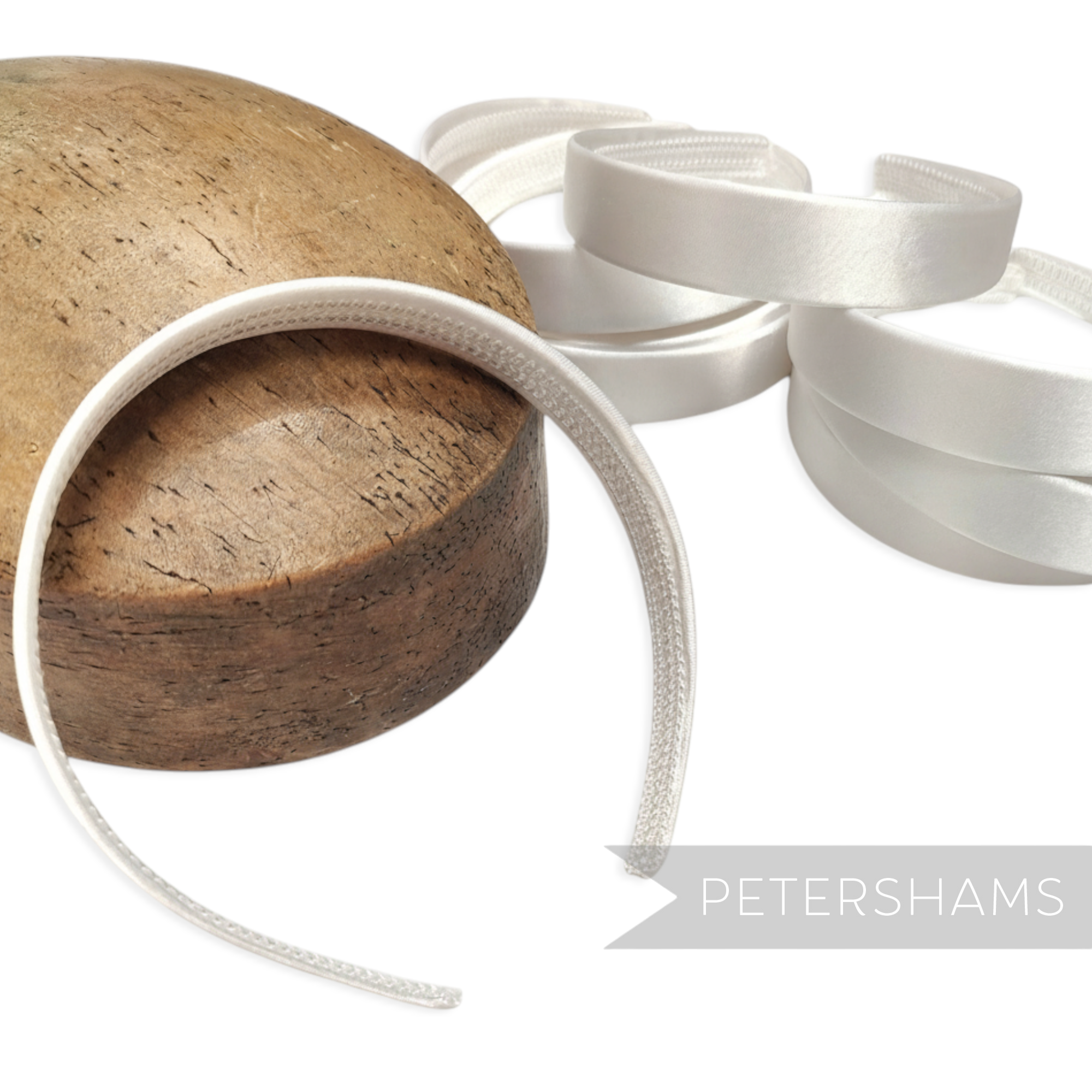 Petershams white satin covered plastic headbands, 24mm wide, ideal for millinery and fascinators.