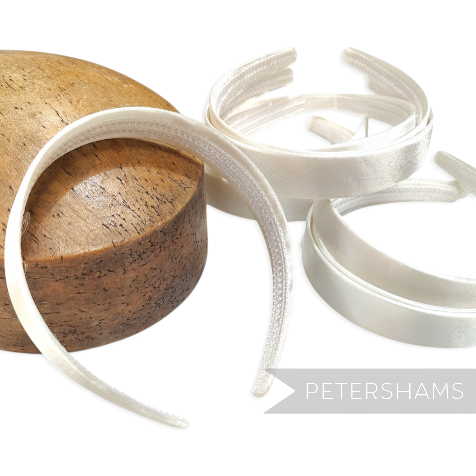 Petershams white satin covered plastic headbands, 24mm wide, ideal for millinery and fascinators.