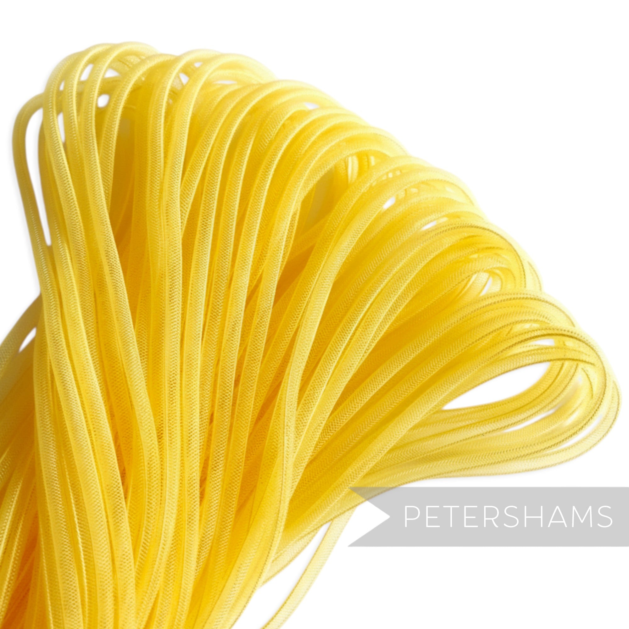 Petershams yellow 4mm tube millinery crin, a sheer mesh trim with a gathered side for shaping.
