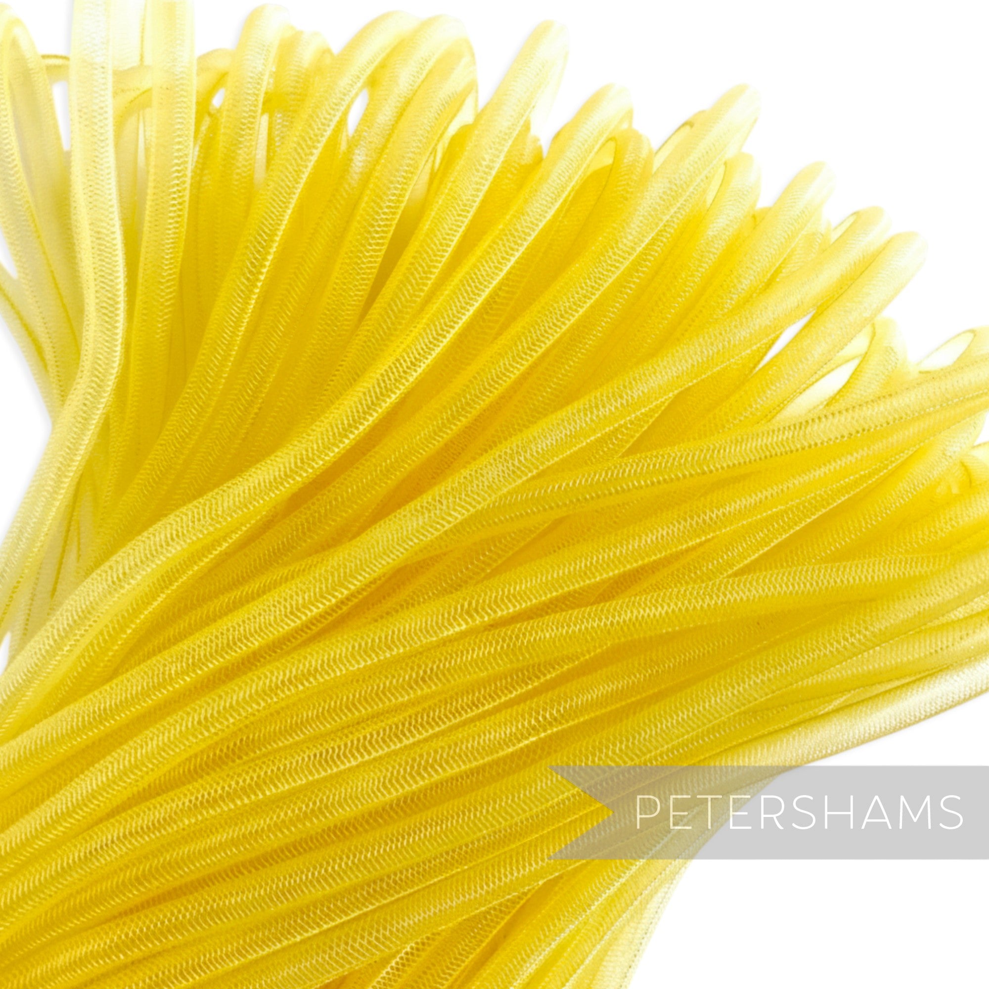 Petershams yellow 6mm tube millinery crin, a slightly sheer mesh trim for hat making and embellishments.