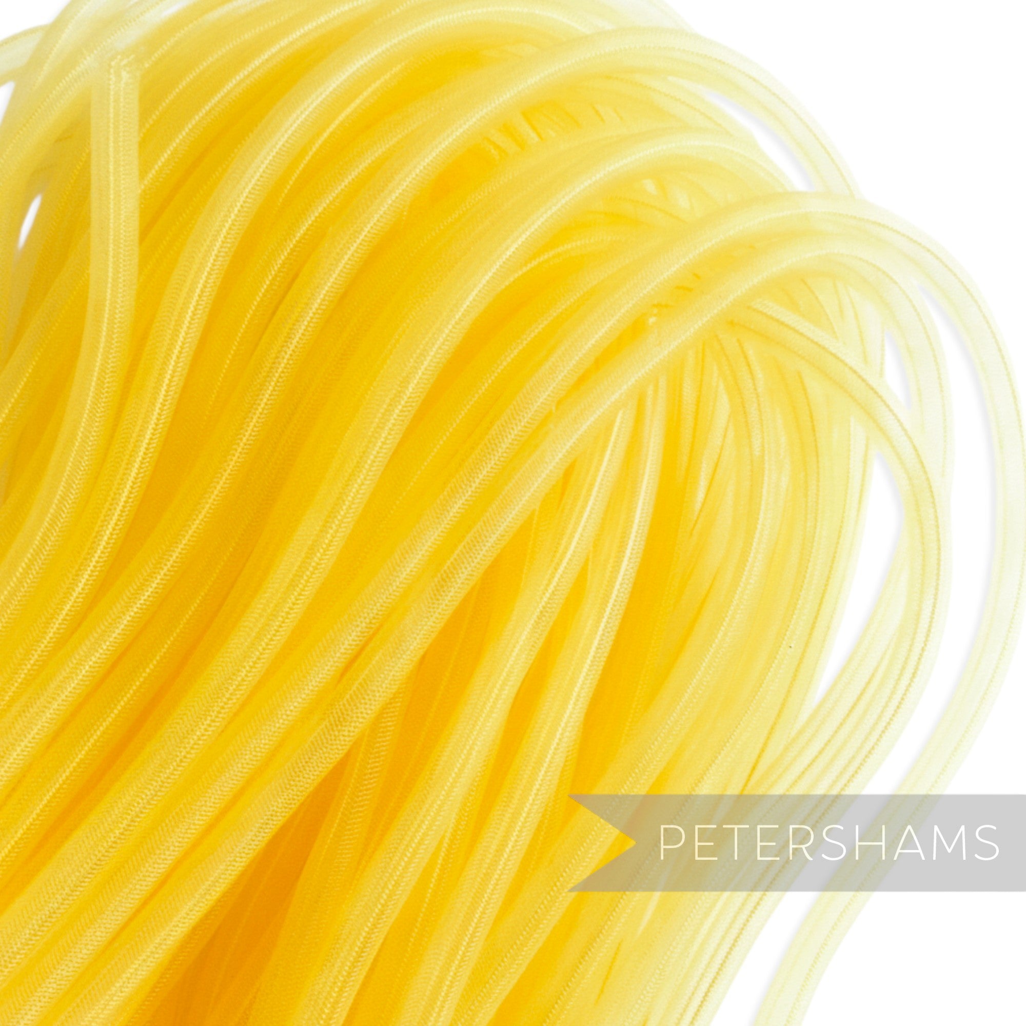 Petershams yellow 8mm tube millinery crin, a slightly sheer tubular mesh for hat making and trims.