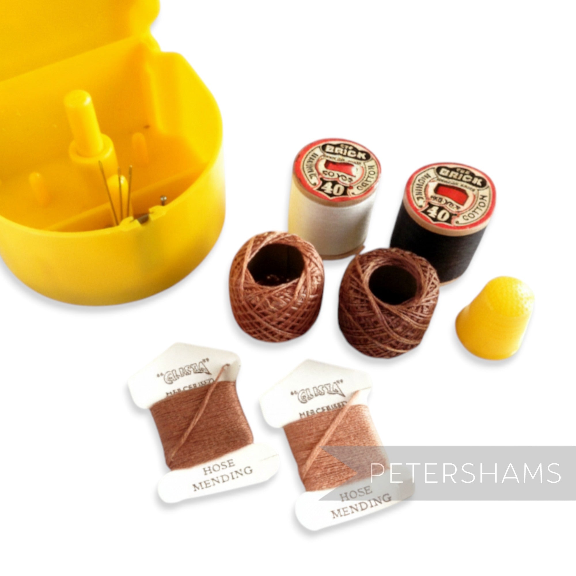 Petershams yellow vintage Presto sewing kit with threads, needles, thimble, and original box. Made in England.