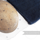 Petershams Millinery Supplies Sharon navy blue vintage veiling with a honeycomb and dotted pattern on a millinery block