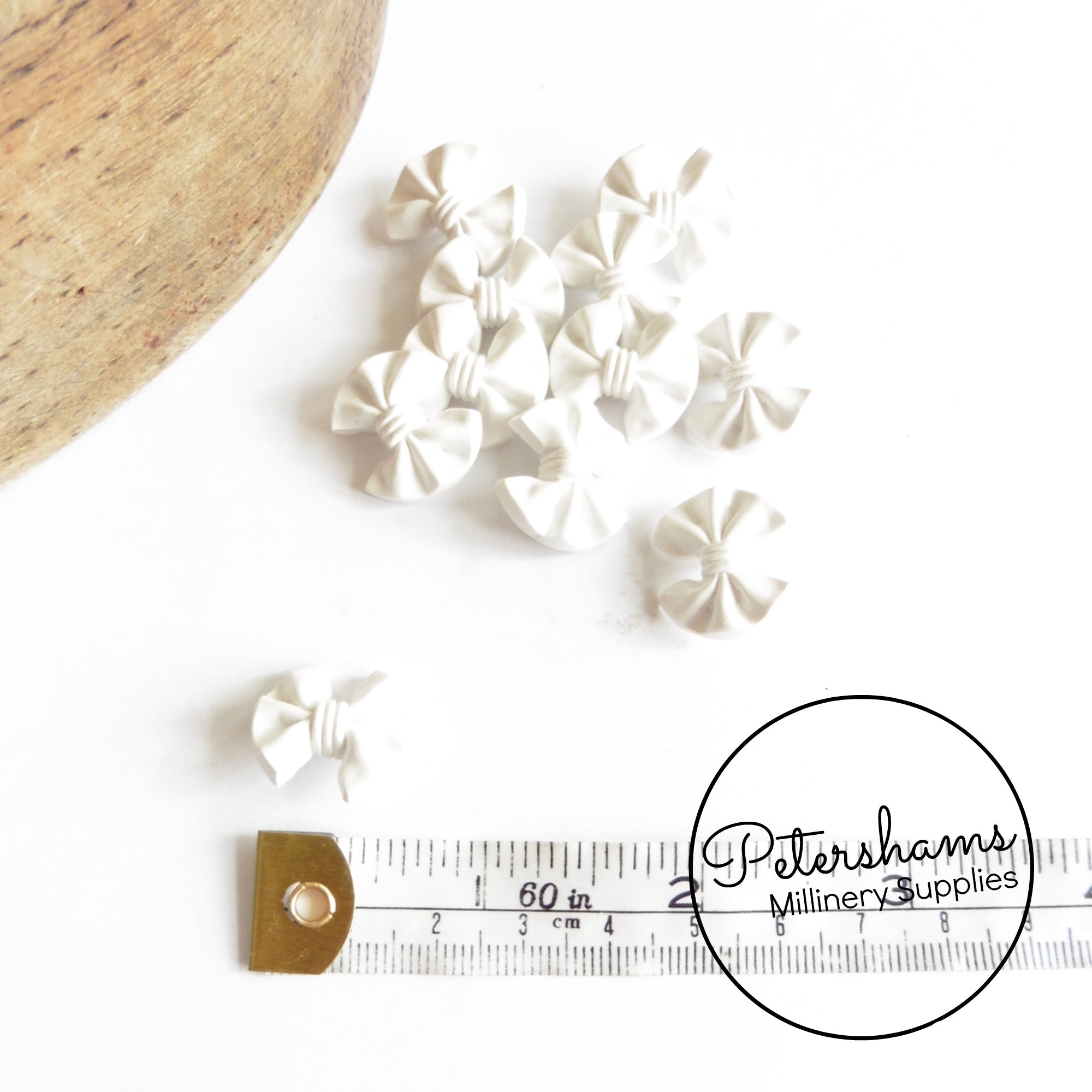 Vintage 1960s White Plastic Bow Buttons – Petershams Millinery Supplies
