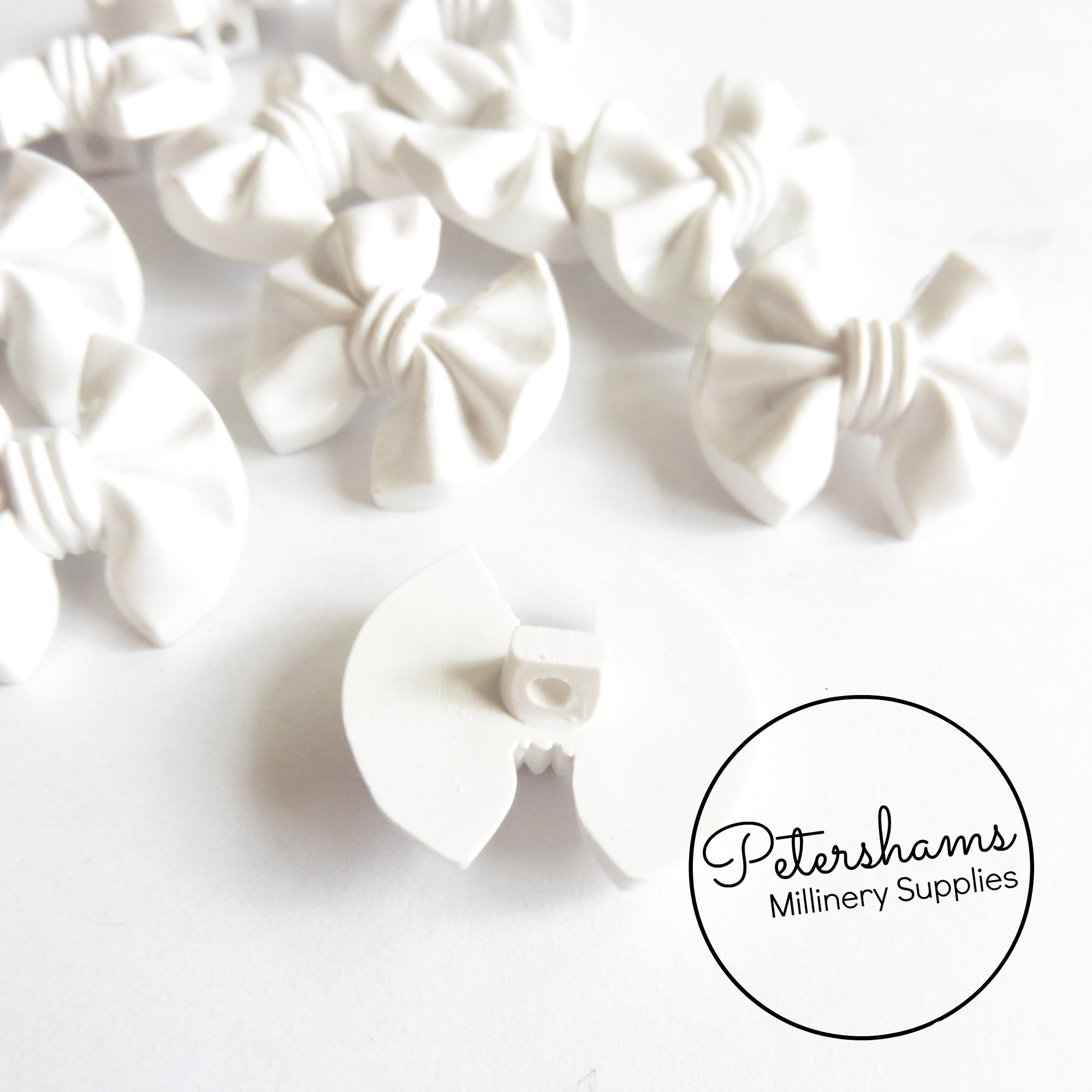 Vintage 1960s White Plastic Bow Buttons – Petershams Millinery Supplies